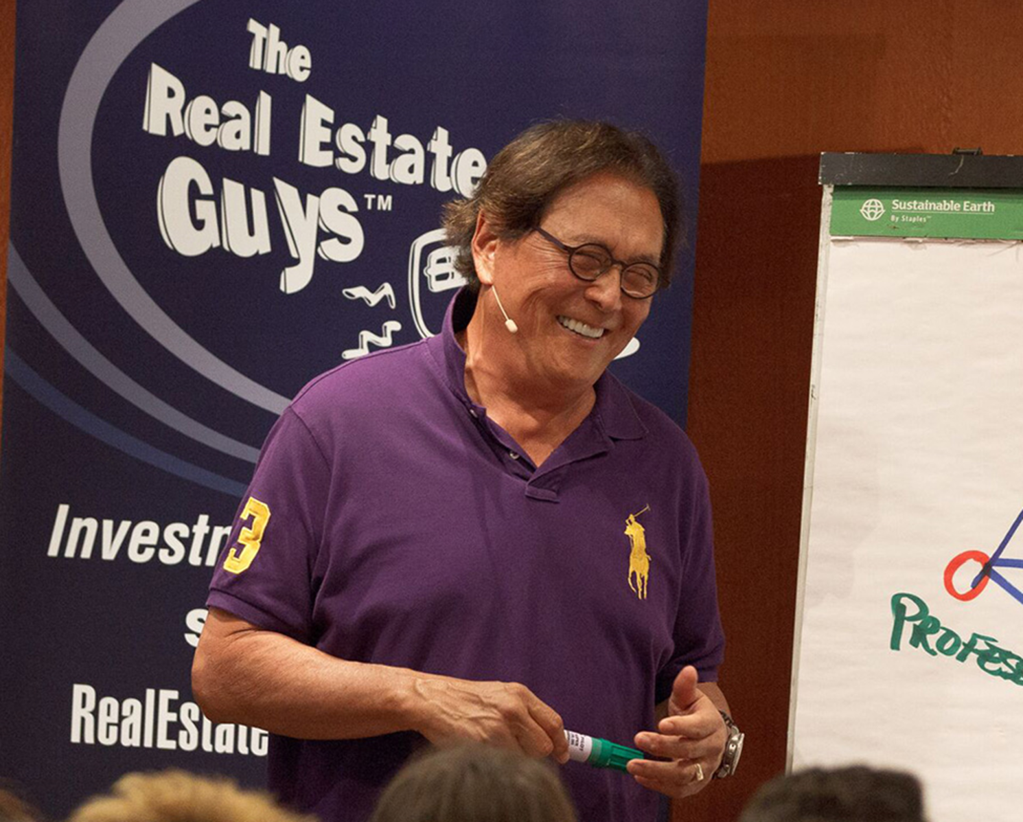 Rich Dad Poor Dad author Robert Kiyosaki teaches on The Real Estate Guys Investor Summit at Sea